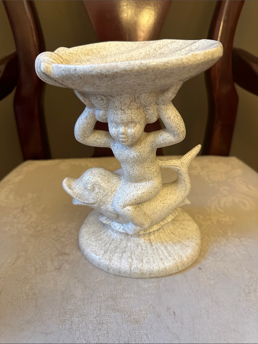 Vintage Holland Mold ceramic cherub riding a dolphin holding a sea shell dish